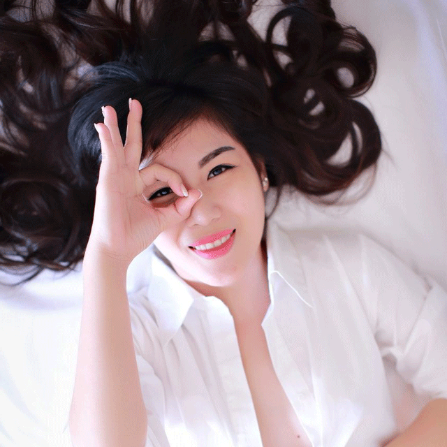 aisian-lady-with-finger-circling-eye-smiling-e1531395982174-1.gif
